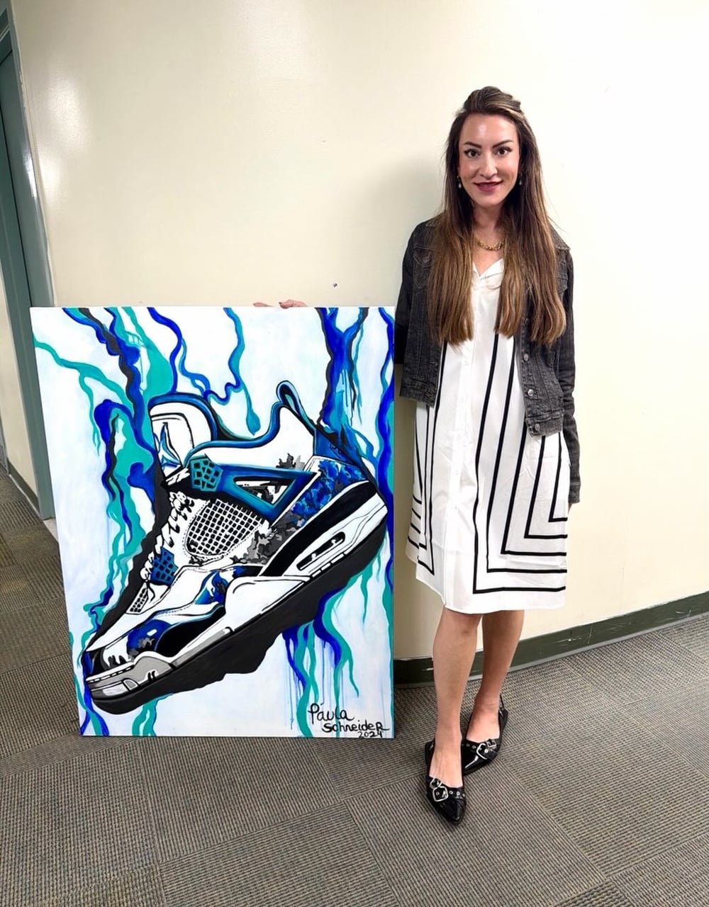 Paula beside a finished large canvas